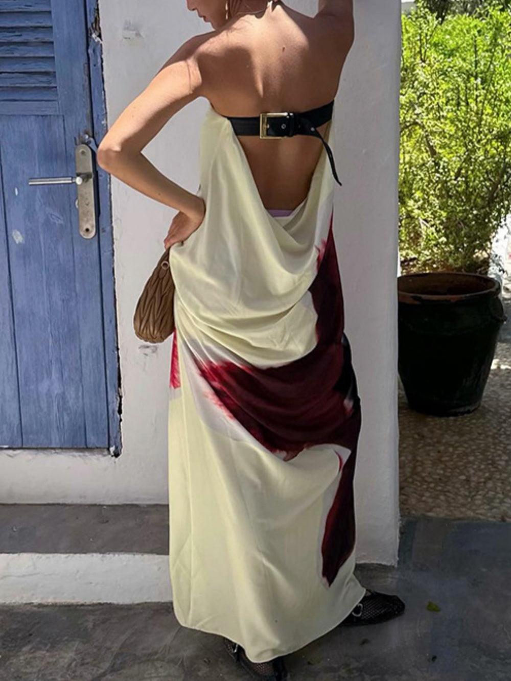 Printed high-neck tube dress with open back and elegant high waist