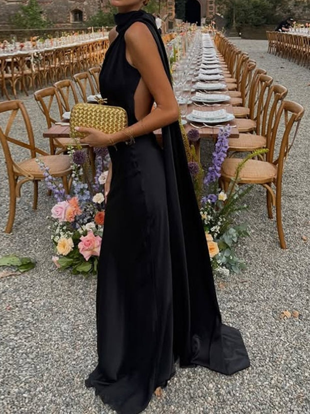 Elegant sleeveless long dress with waist tie and halter neck for women