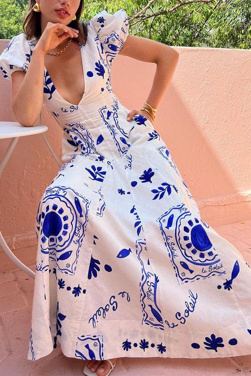 Long Flared Dress with Puff Sleeves and Deep V-Neck with Fancy Print