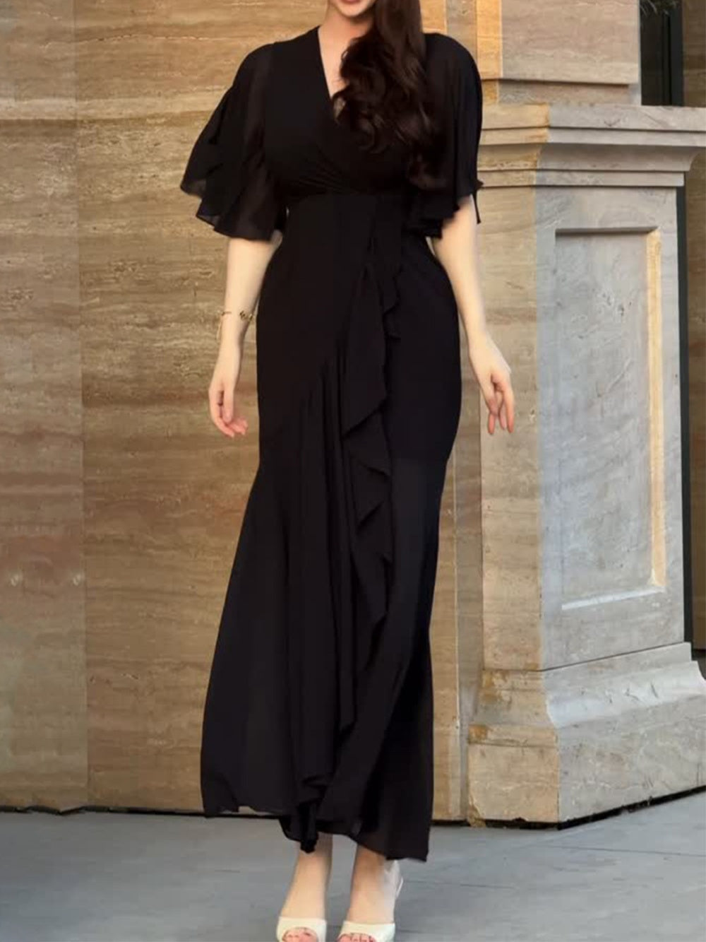 Vintage V-neck dress with bell sleeves and elegant pattern