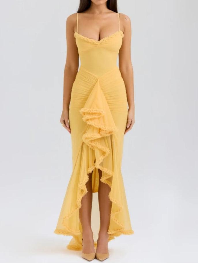 Elegant dress with pleated detail in apricot with frill finish in the front
