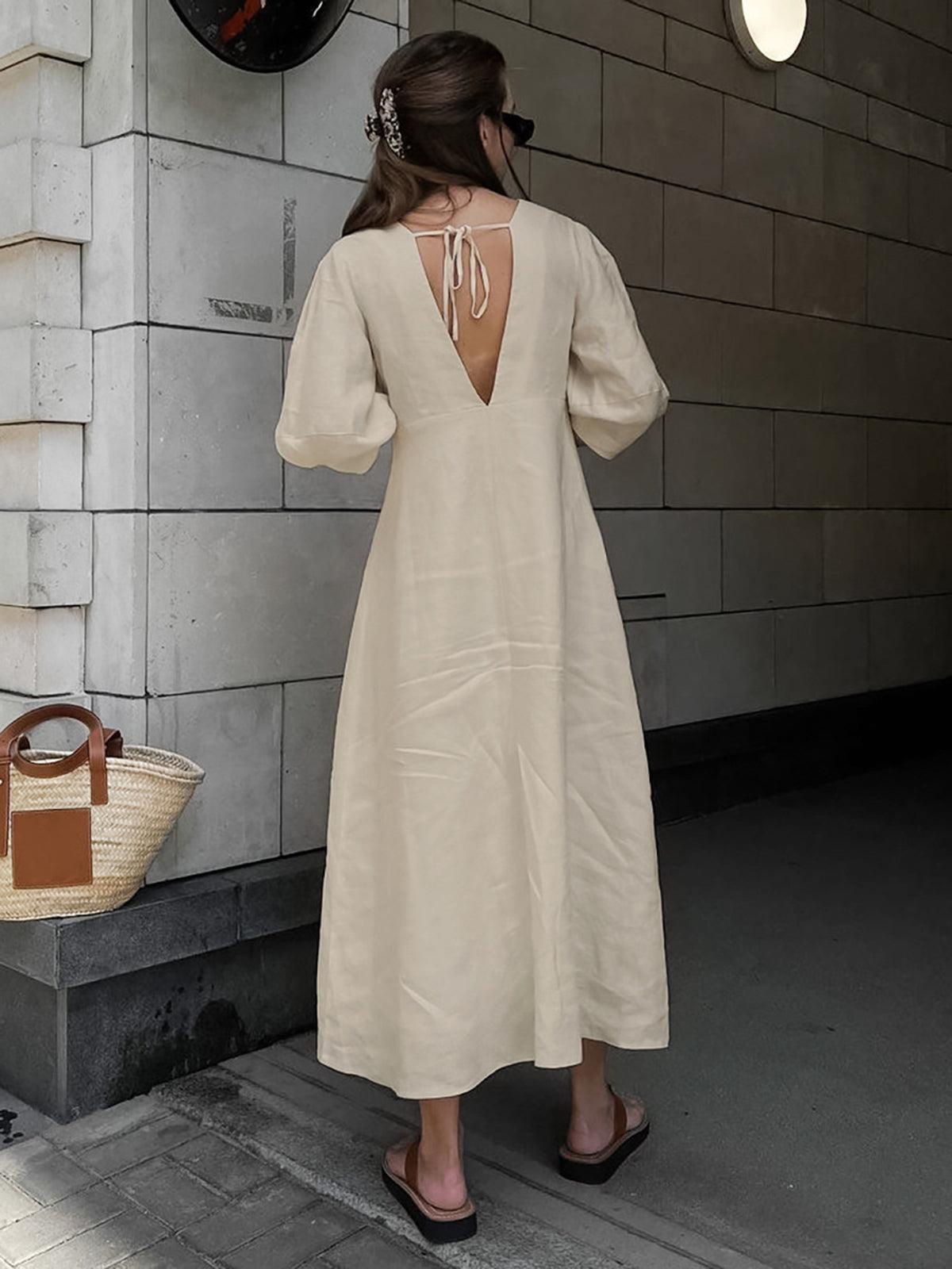 Elegant cotton-linen dress with button placket and knot design