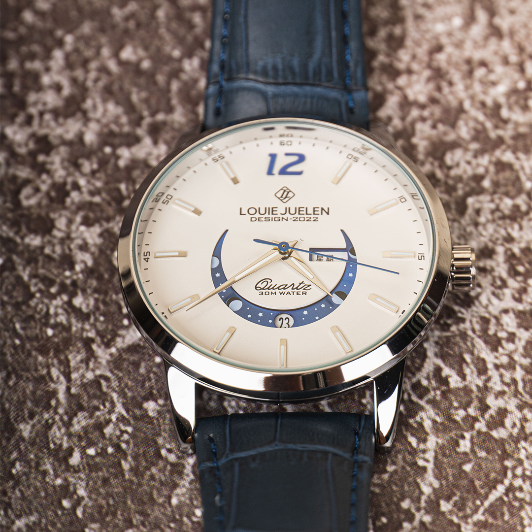 Elegant watch with luminous moon phase