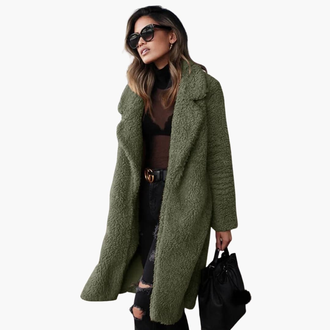 Luxurious women's long teddy fur coat with a wide collar and textured surface