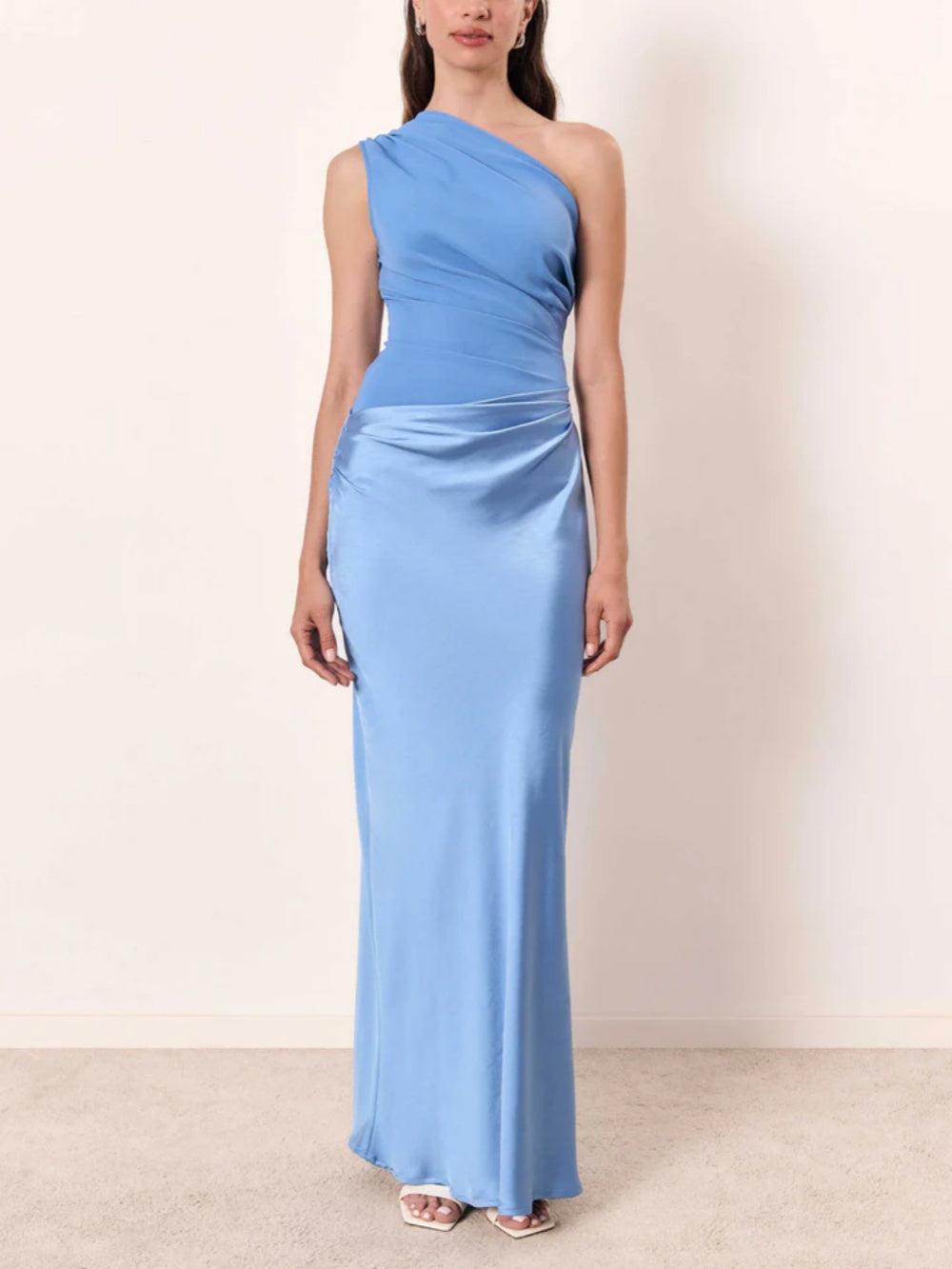 Long asymmetrical evening gown with off-the-shoulder design and elegant pleats