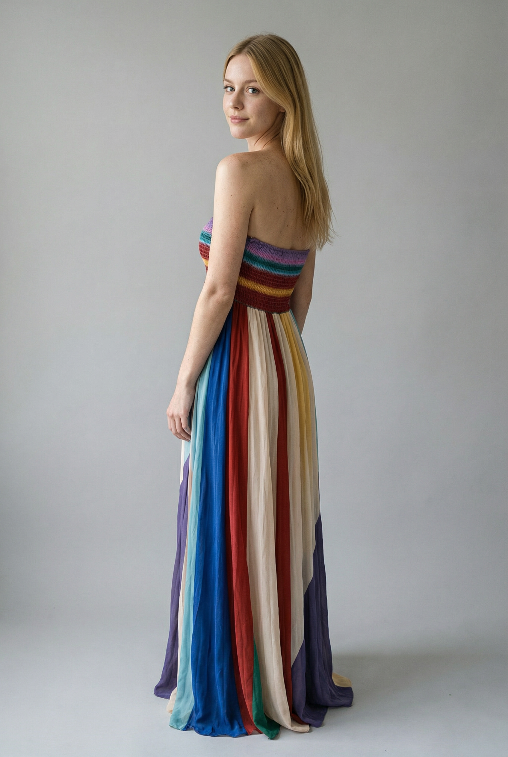 Elegant striped pleated long dress with off-the-shoulder design for a sophisticated look