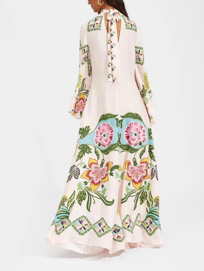 Elegant flowing long dress with sunny floral pattern