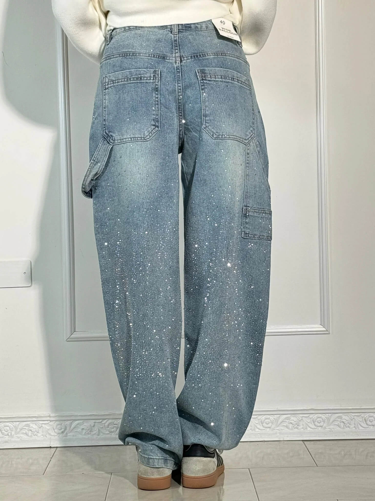 Victoria - High-waisted gold jeans with glitter