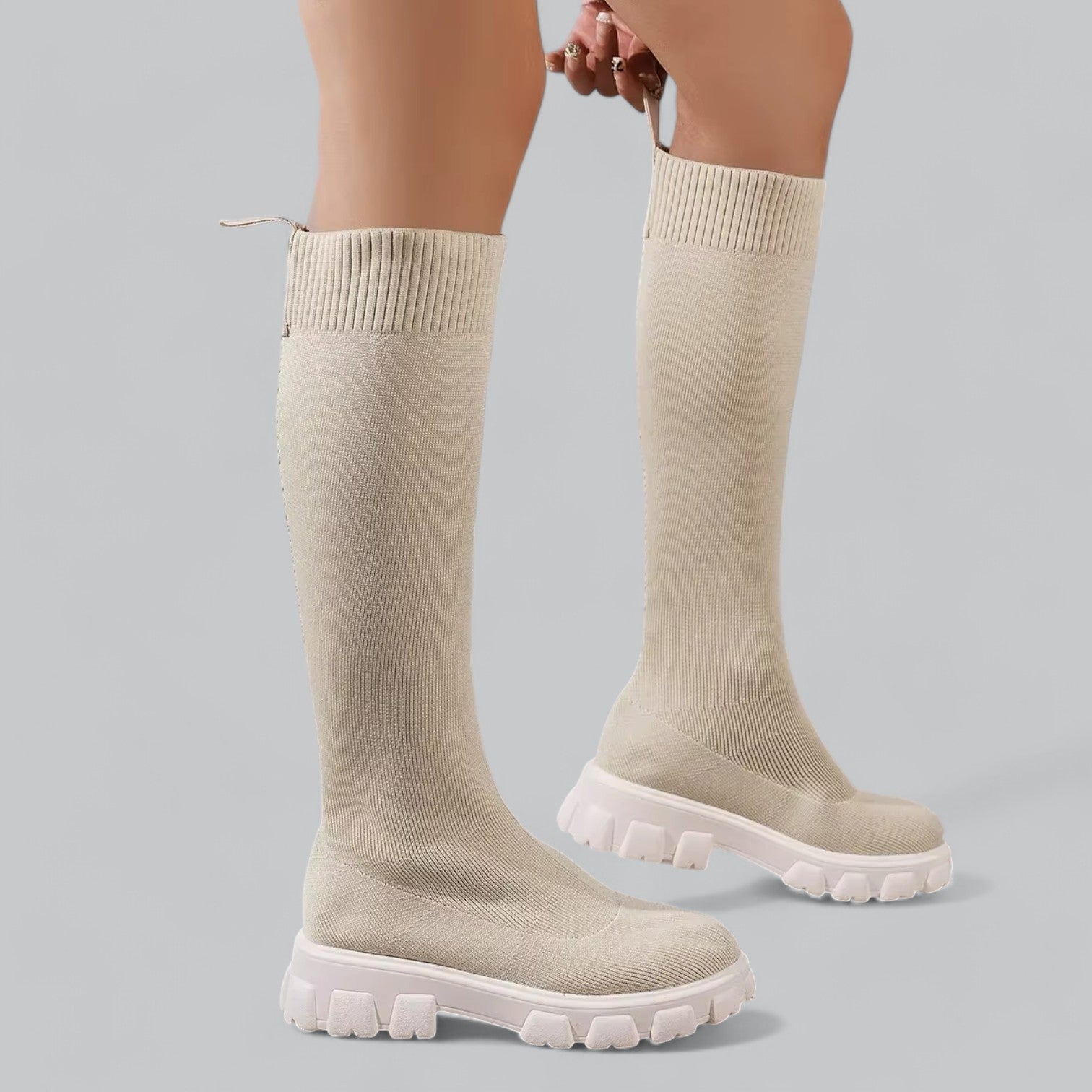 Stylish women's knee-high boots with chunky platform heels