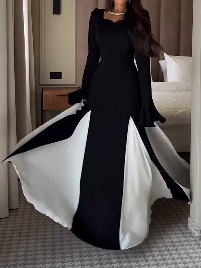 Elegant Black and White Flared Long-Sleeved Maxi Dress for a Timeless Look