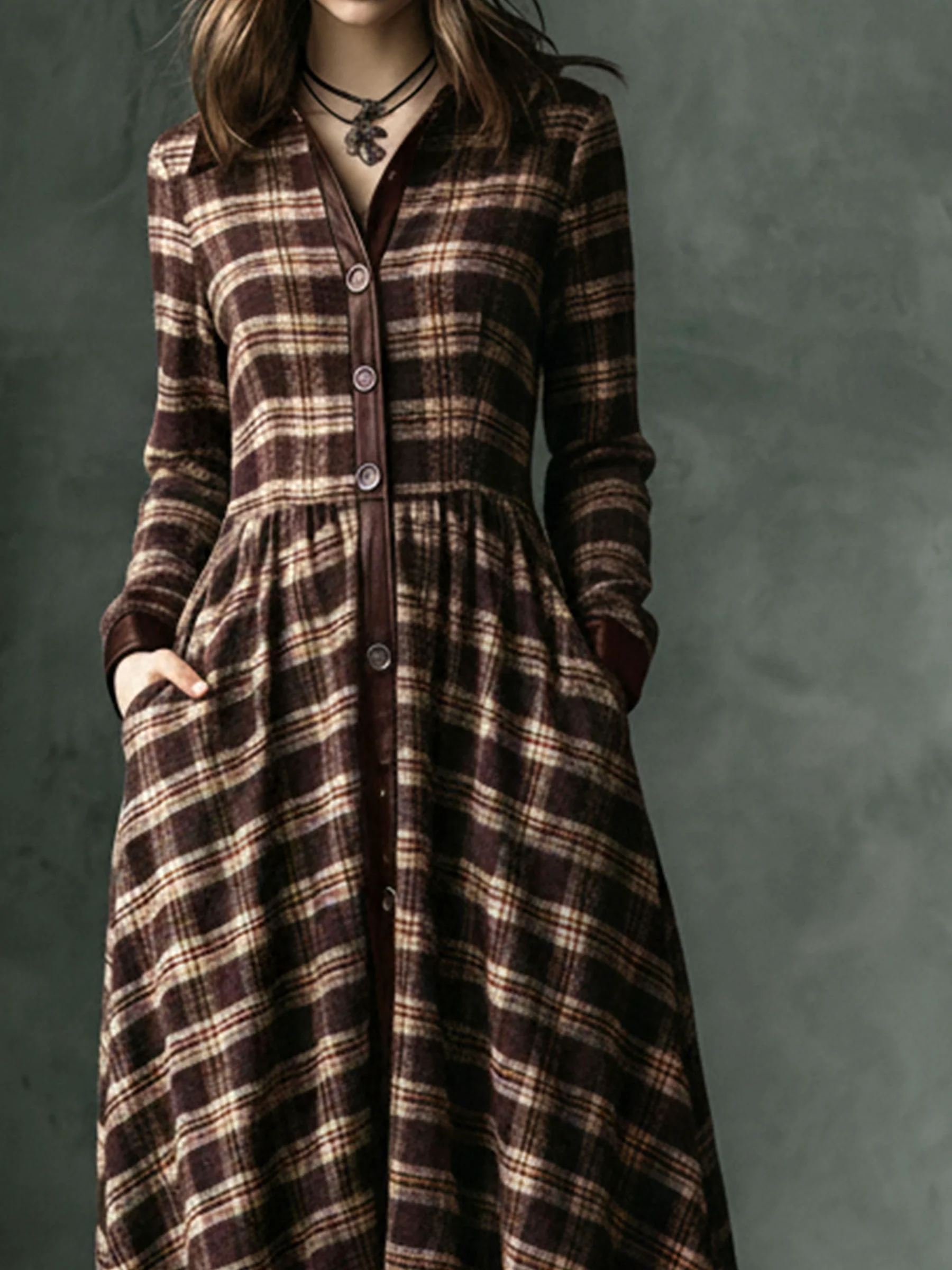Maxi dress with brown checkered pattern, retro pockets, and elegant lapel details