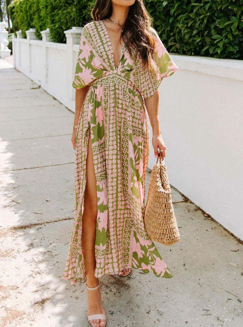 Floral dress with plunging neckline and three-quarter sleeves