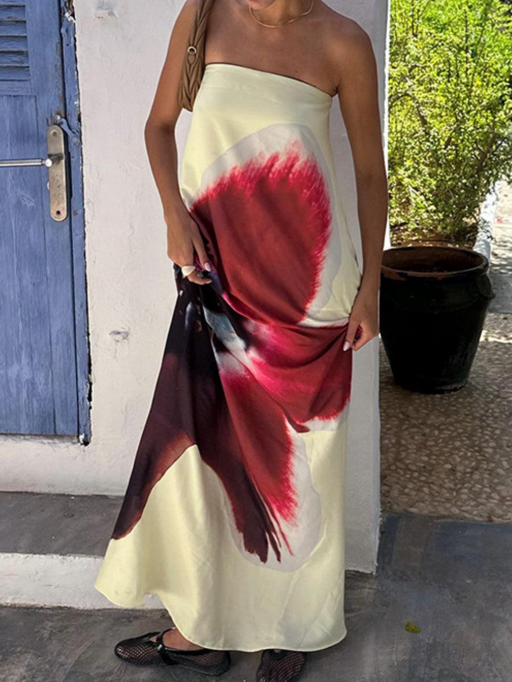 Printed high-neck tube dress with open back and elegant high waist