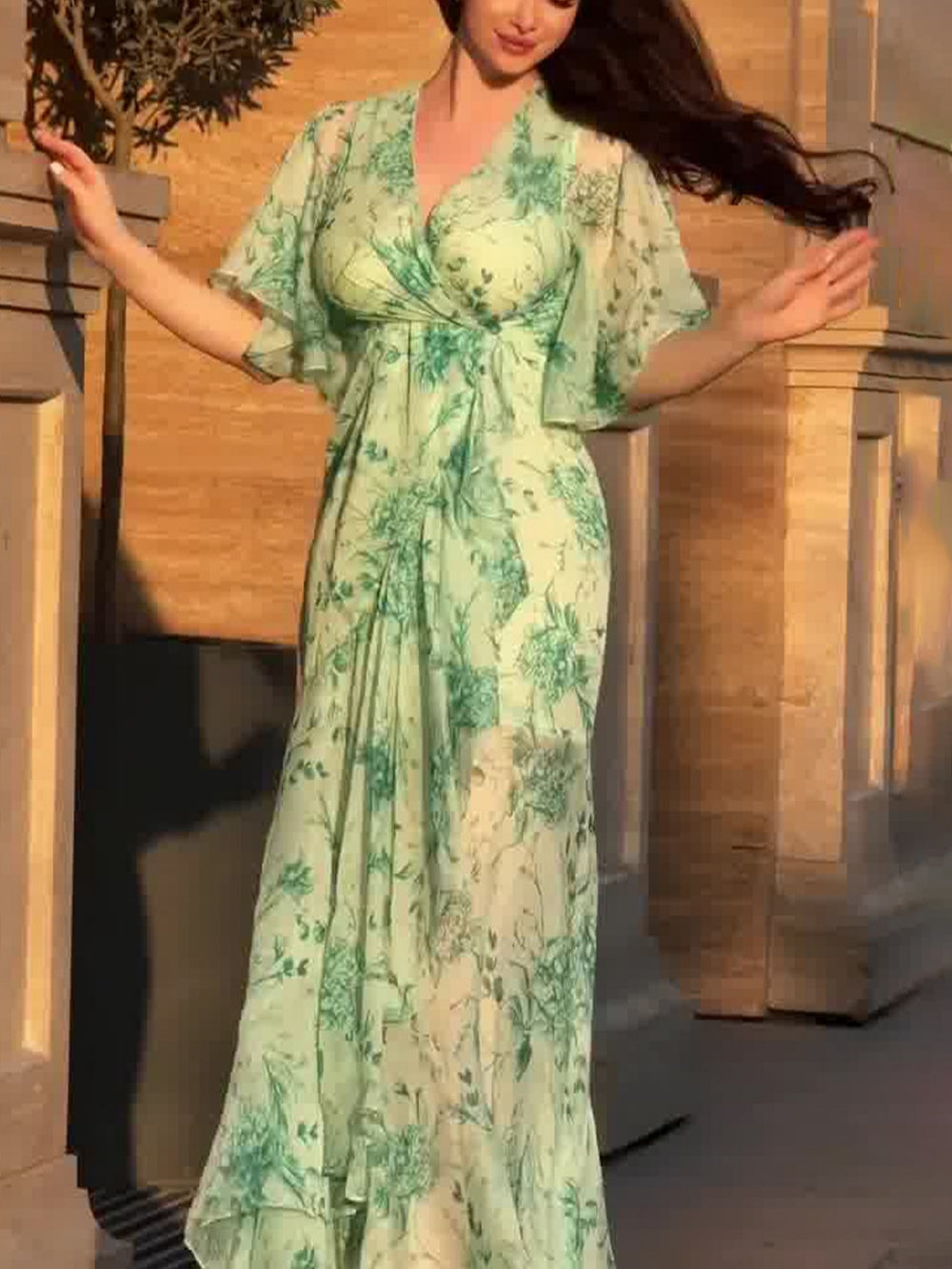 Vintage V-neck dress with bell sleeves and elegant pattern