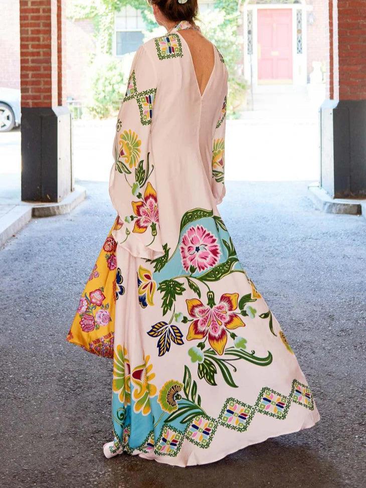 Elegant flowing long dress with sunny floral pattern