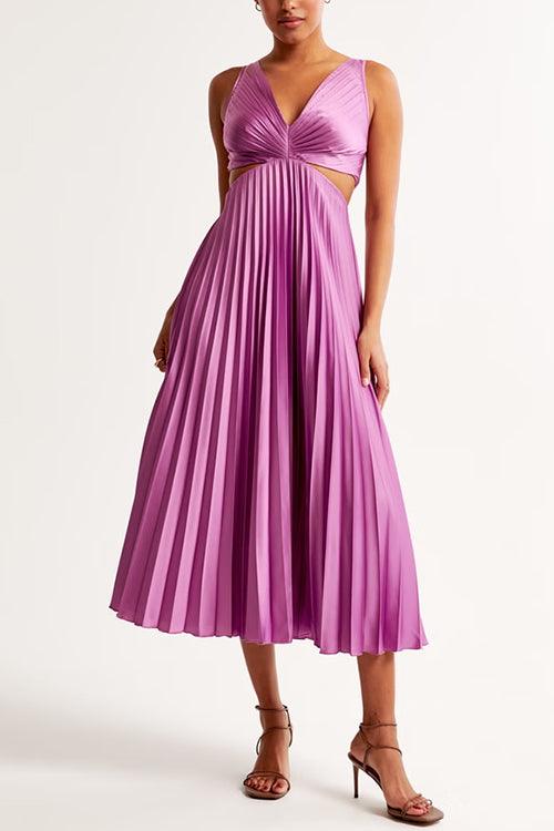 Maxi dress with V-neckline, cut-out waist, and sleeveless pleated design