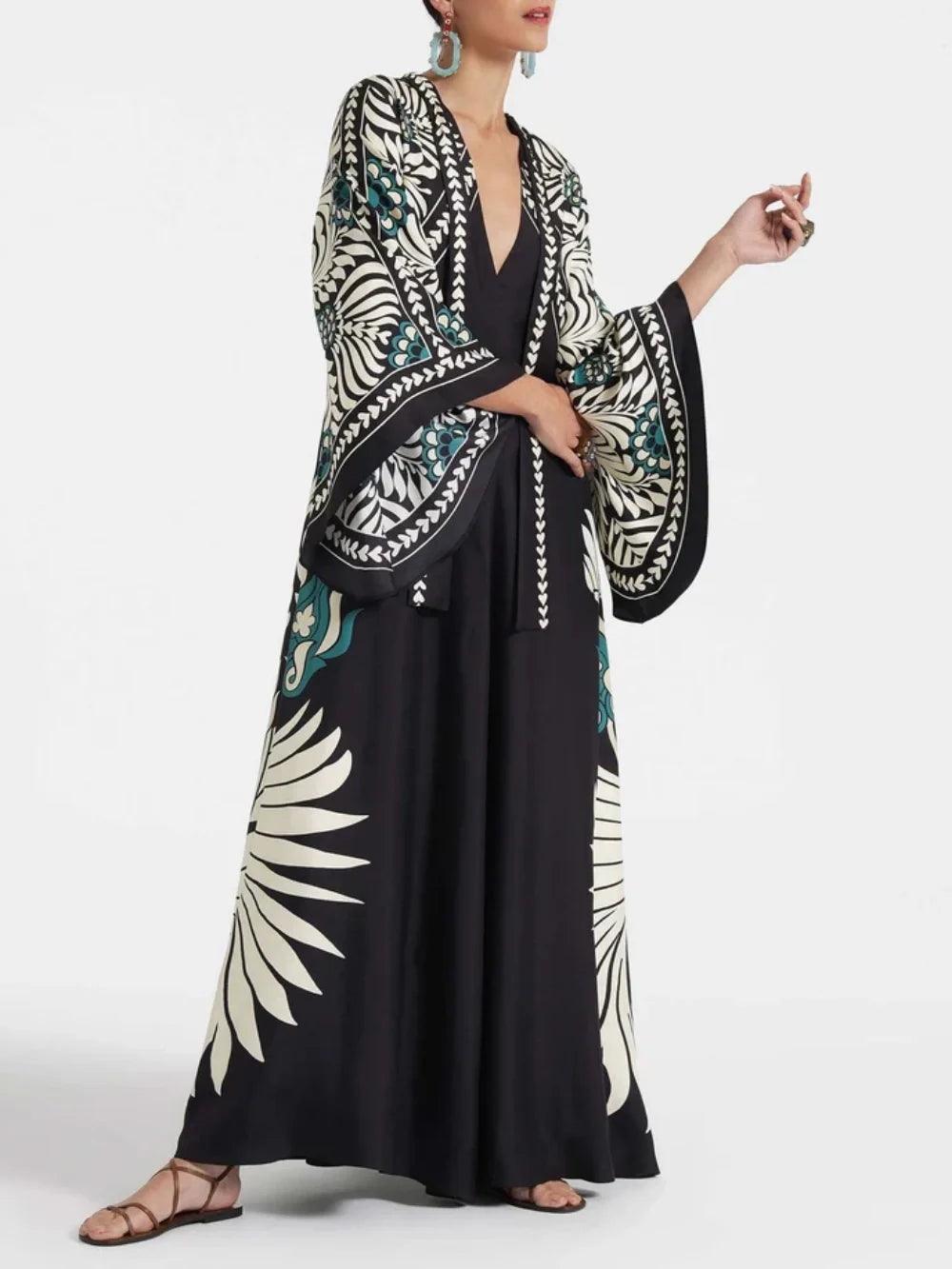 Elegant Maxi Dress with Floral Print and Cascade Sleeves