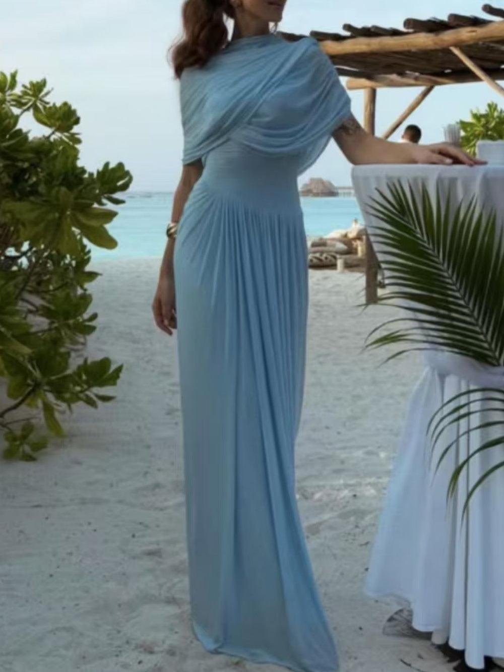 Long pleated maxi cape-style dress for an elegant and sophisticated look