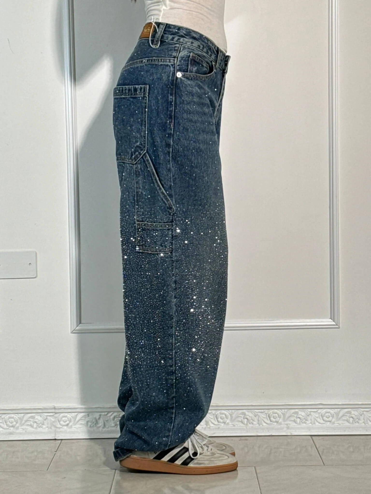 Victoria - High-waisted gold jeans with glitter