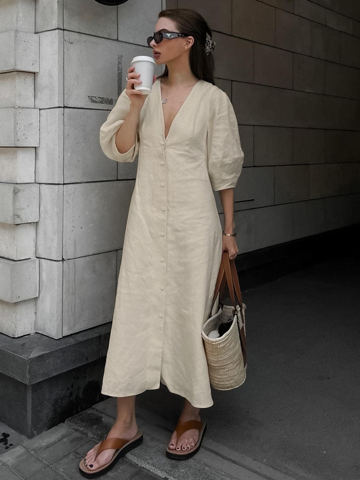 Elegant cotton-linen dress with button placket and knot design