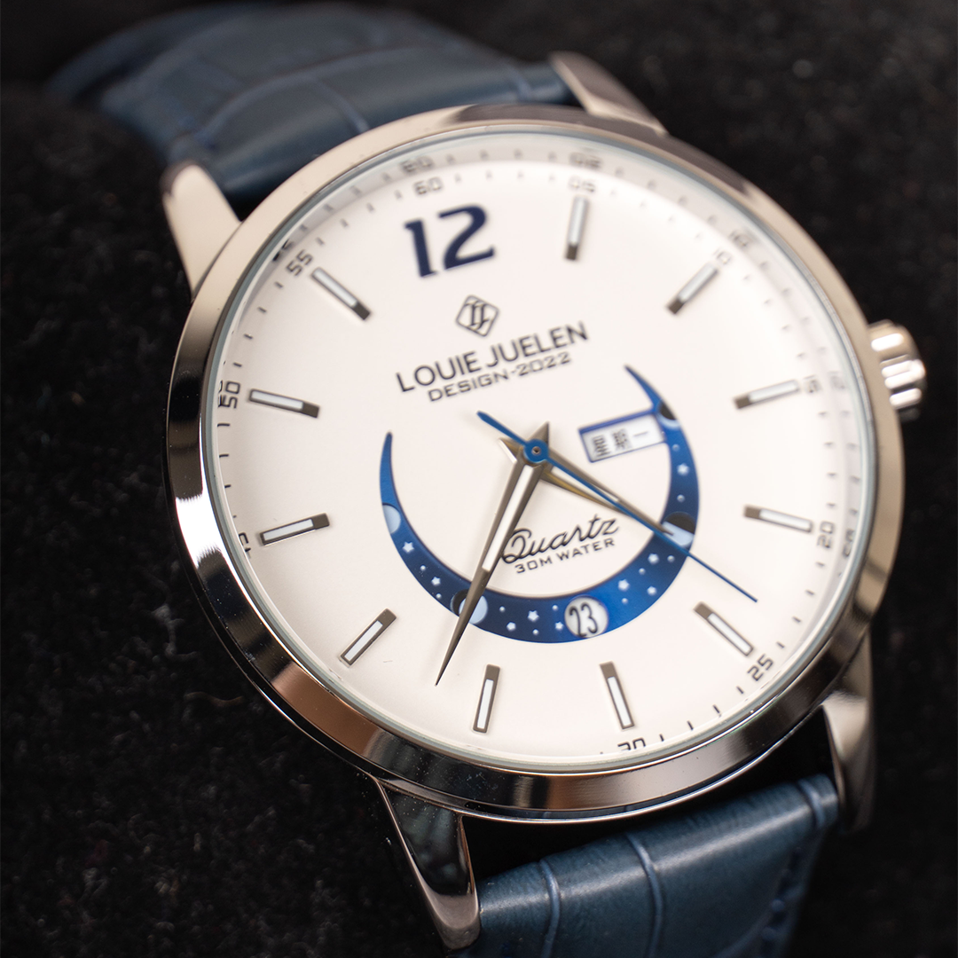 Elegant watch with luminous moon phase