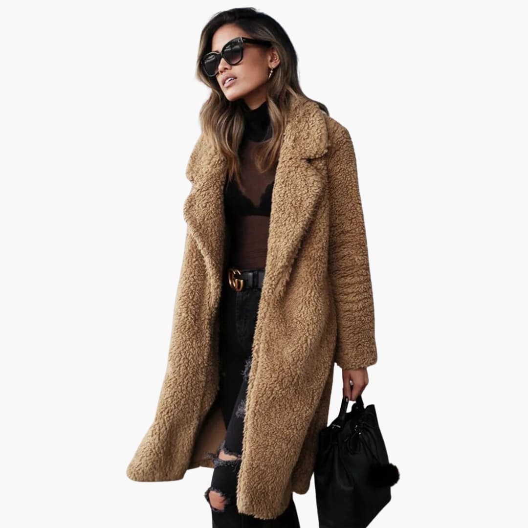 Luxurious women's long teddy fur coat with a wide collar and textured surface