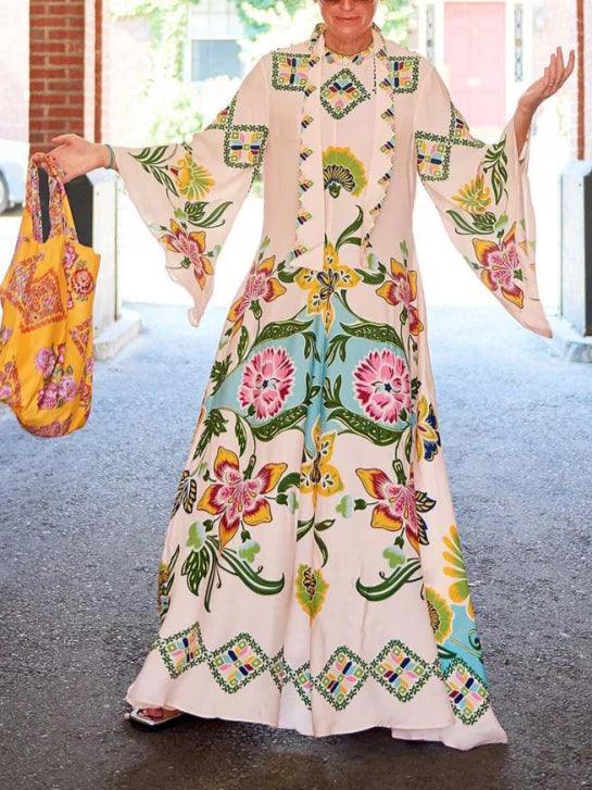 Elegant flowing long dress with sunny floral pattern