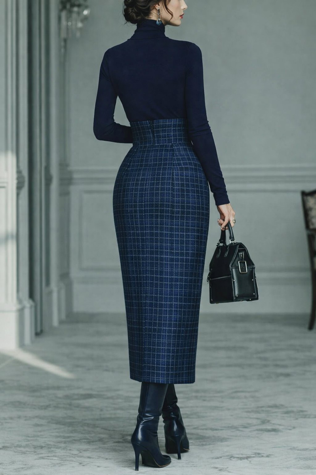 Navy stretch-knit turtleneck top with a matching plaid skirt set