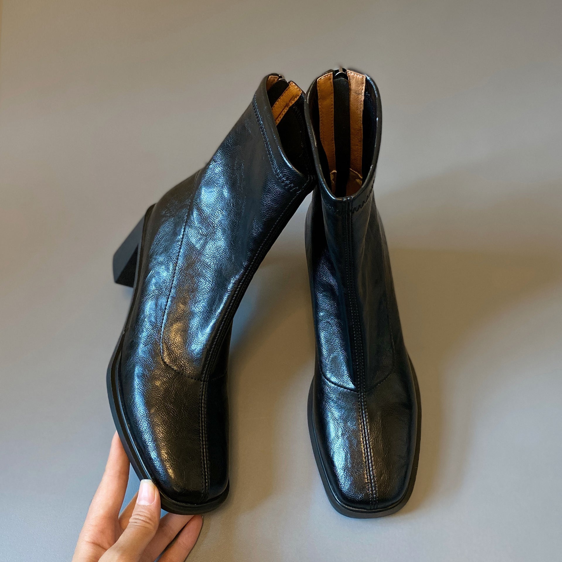 Elegant square-toe heeled boots