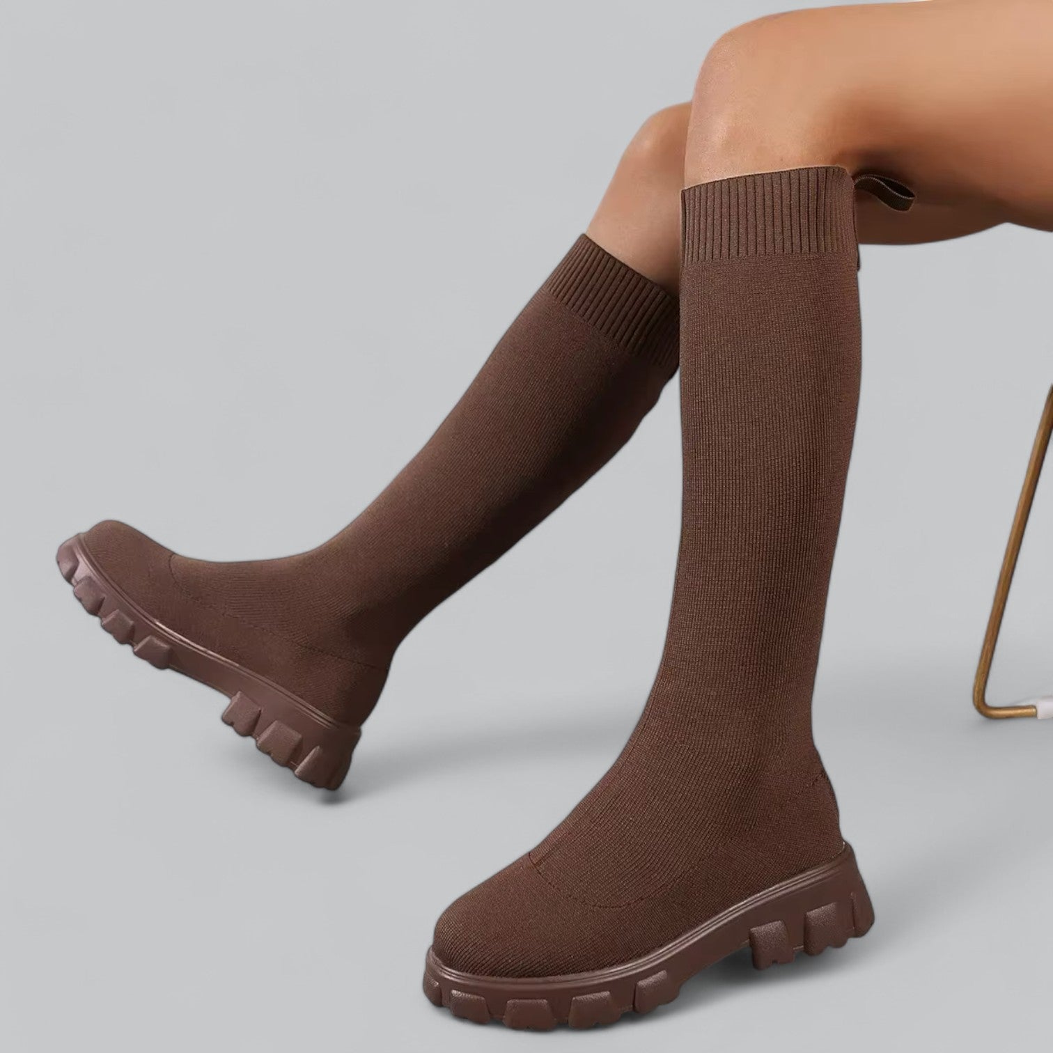 Stylish women's knee-high boots with chunky platform heels