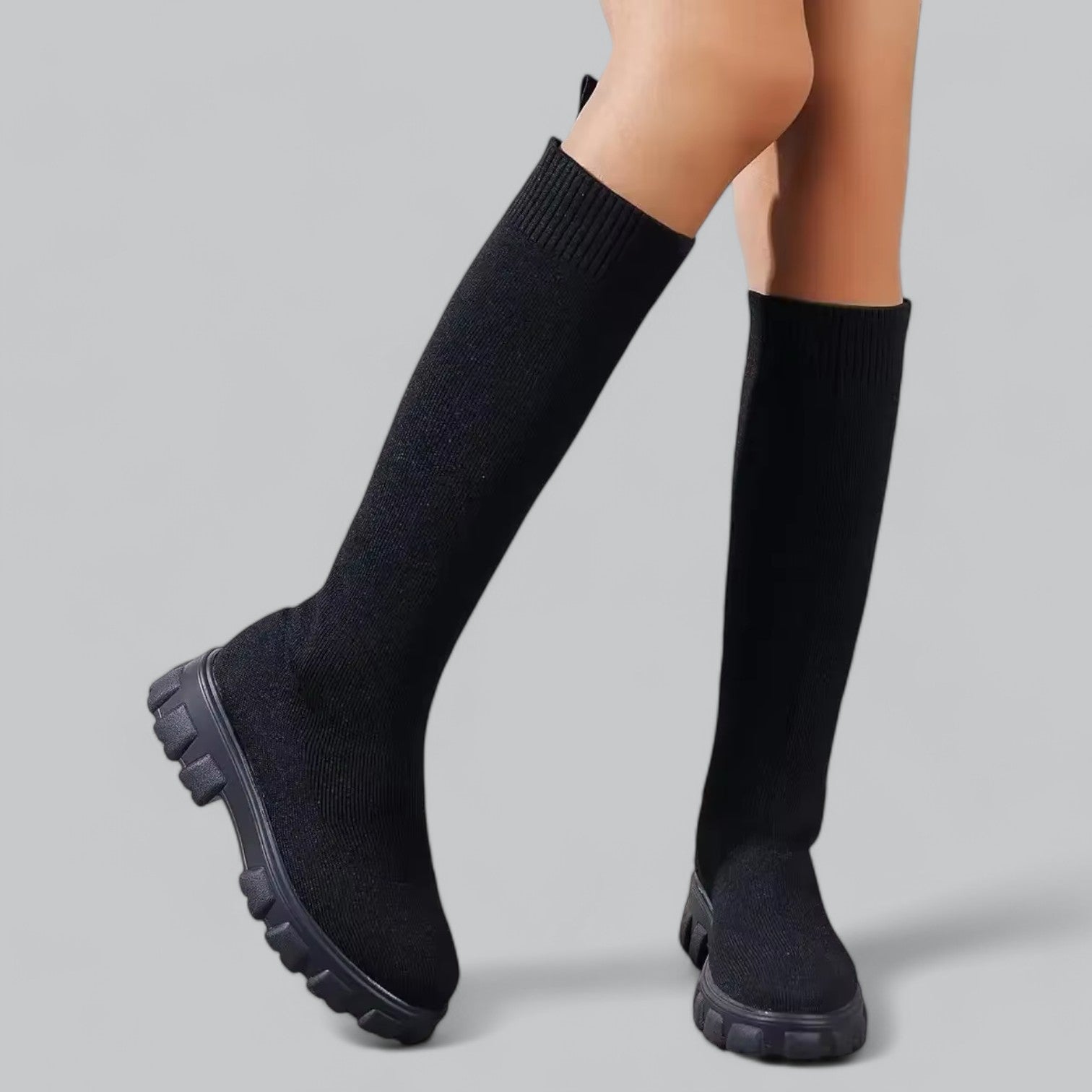 Stylish women's knee-high boots with chunky platform heels