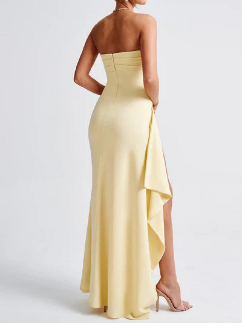 Long strapless gown with a dramatic slit