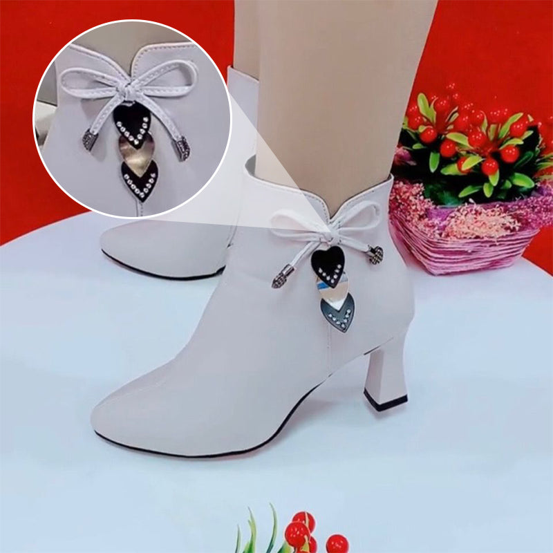 Elegant pointed toe ankle boots with chic bow detail